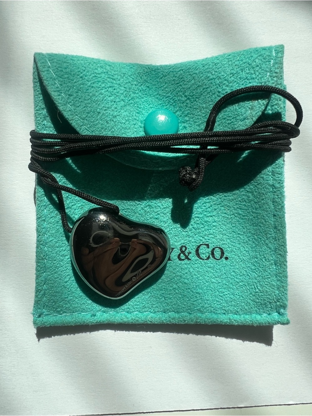 Tiffany&Co. Elsa Peretti Ruthenium Full Heart Pendant on Black Silk Cord +Pouch